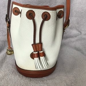 Dooney & Bourke white drawstring bucket